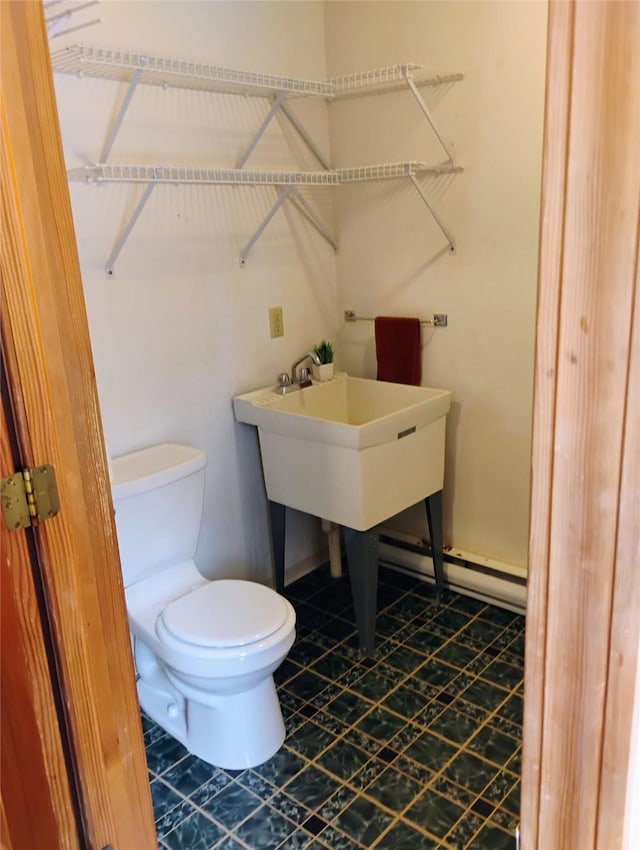 5 Pronghorn Dr, Clancy, MT 59634 - half bath with toilet and a baseboard radiator
