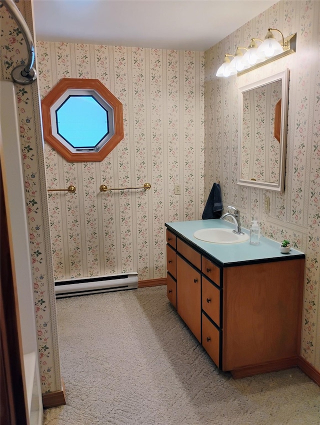 5 Pronghorn Dr, Clancy, MT 59634 - full bathroom with a baseboard heating unit, vanity, and a bath