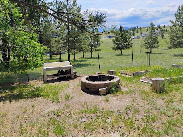 5 Pronghorn Dr, Clancy, MT 59634 - view of yard with an outdoor fire pit