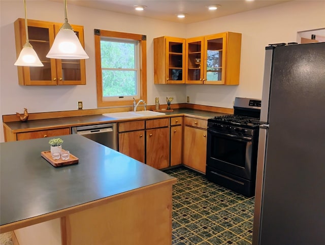 5 Pronghorn Dr, Clancy, MT 59634 - kitchen with appliances with stainless steel finishes, hanging light fixtures, glass insert cabinets, recessed lighting, and dark flooring