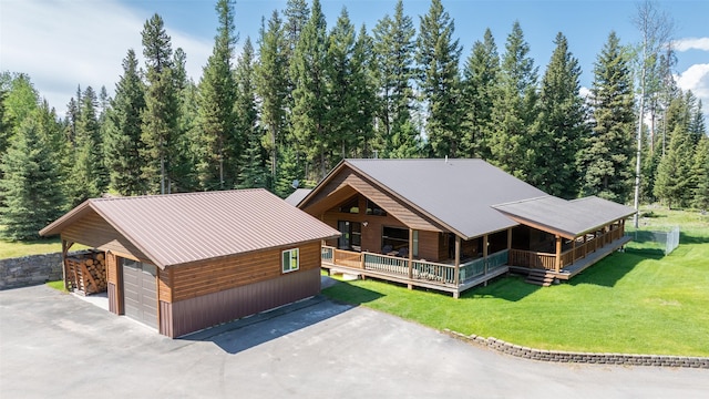 1065 Evergreen Dr, Seeley Lake, MT 59868 - view of subject property featuring a heavily wooded area