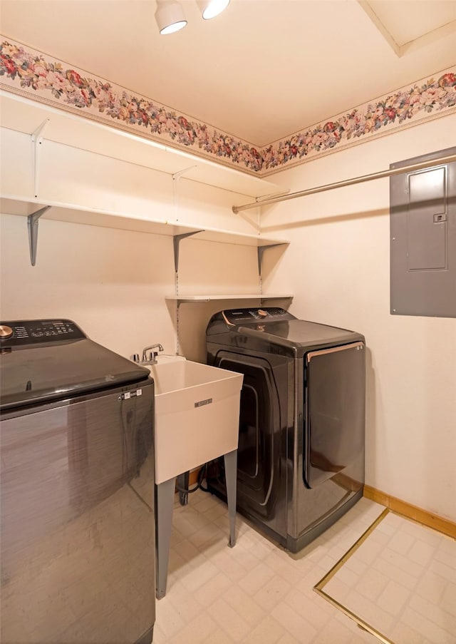 1065 Evergreen Dr, Seeley Lake, MT 59868 - laundry room featuring electric panel and separate washer and dryer