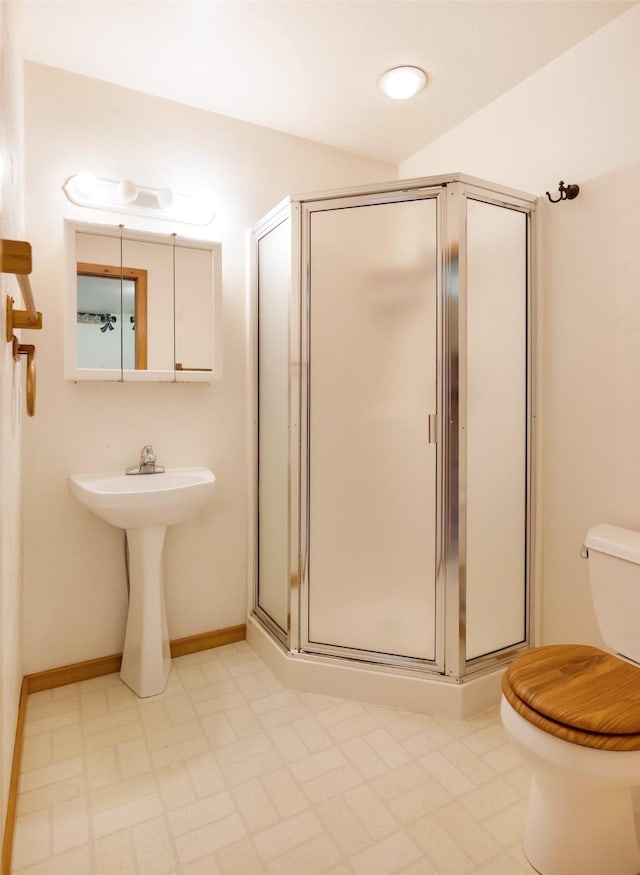 1065 Evergreen Dr, Seeley Lake, MT 59868 - bathroom with a shower stall and tile patterned floors