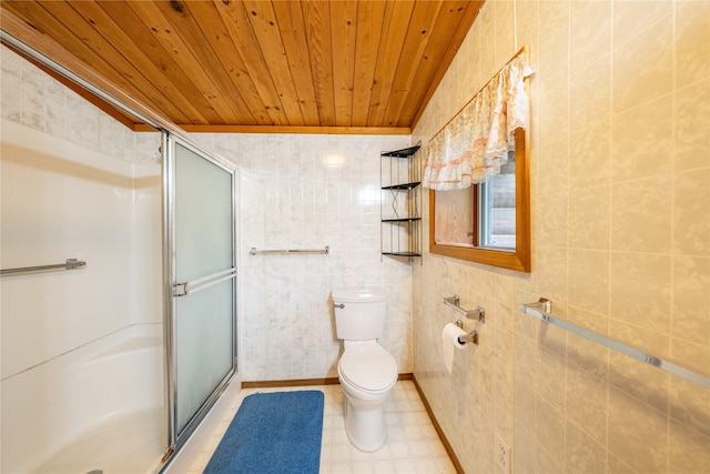 137 Amber Rd, Troy, MT 59935 - full bath featuring wood ceiling, a stall shower, toilet, tile walls, and tile patterned floors