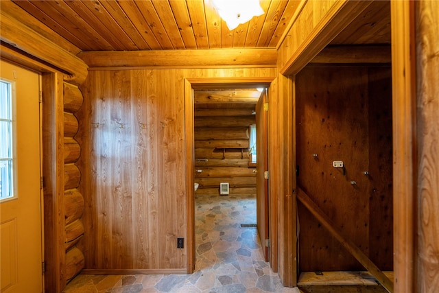 137 Amber Rd, Troy, MT 59935 - hall with log walls, wooden ceiling, and healthy amount of natural light