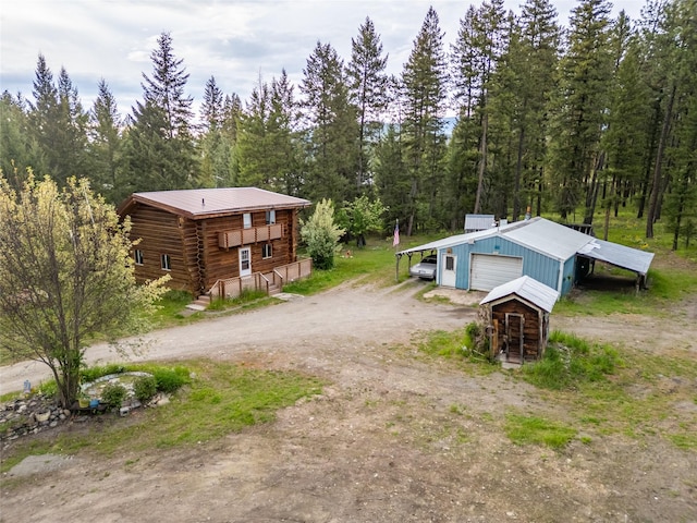 137 Amber Rd, Troy, MT 59935 - view from above of property with a heavily wooded area