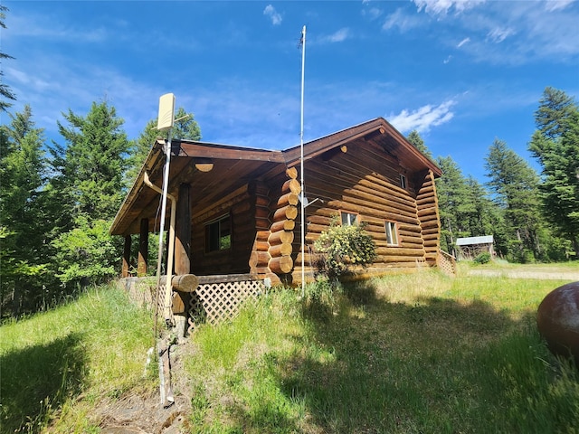 137 Amber Rd, Troy, MT 59935 - view of property exterior featuring log exterior