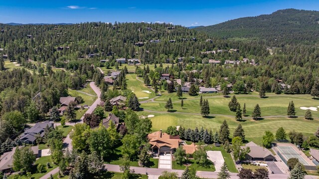 309 Fairway Dr, Whitefish, MT 59937 - drone / aerial view of a mountainous background and a golf course