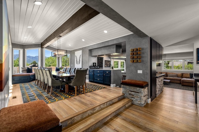 309 Fairway Dr, Whitefish, MT 59937 - dining room with light wood-style flooring, beam ceiling, recessed lighting, and a chandelier