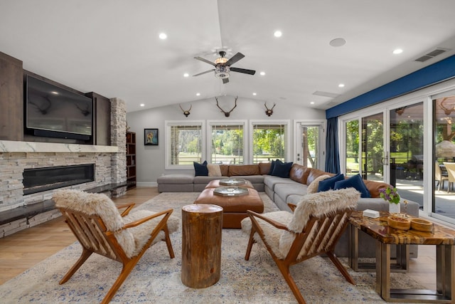 309 Fairway Dr, Whitefish, MT 59937 - living area featuring vaulted ceiling, a ceiling fan, light wood-style floors, recessed lighting, and a fireplace