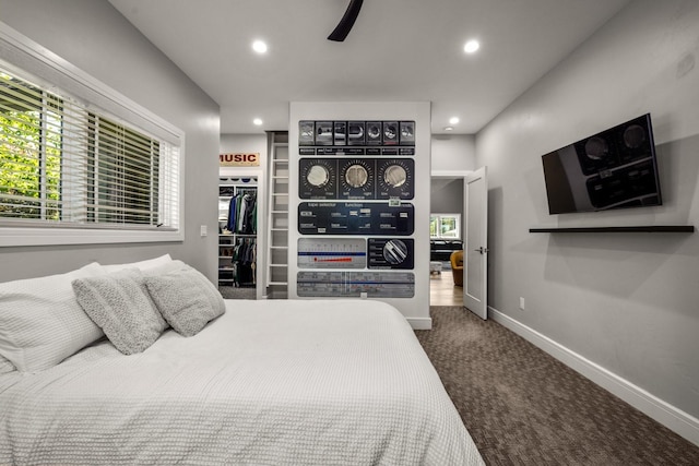 309 Fairway Dr, Whitefish, MT 59937 - carpeted bedroom with recessed lighting, a spacious closet, a ceiling fan, and a closet