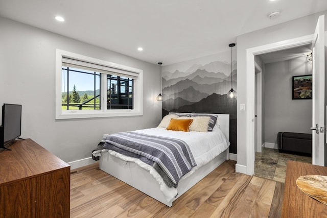 309 Fairway Dr, Whitefish, MT 59937 - bedroom with wood finished floors and recessed lighting