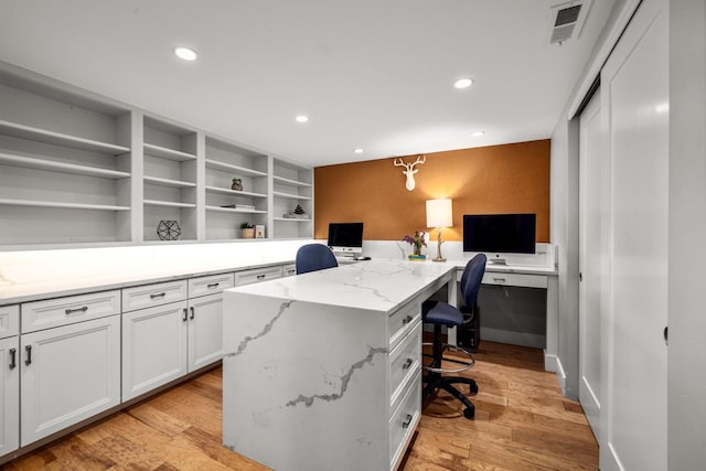 309 Fairway Dr, Whitefish, MT 59937 - office area with recessed lighting, light wood-type flooring, and built in desk