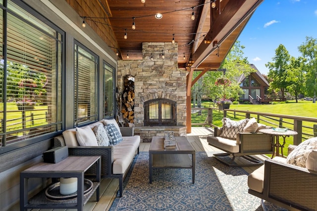 309 Fairway Dr, Whitefish, MT 59937 - view of patio with an outdoor living space with a fireplace
