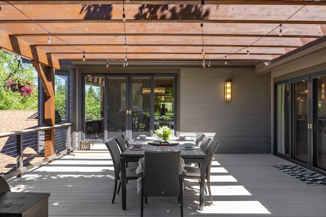 309 Fairway Dr, Whitefish, MT 59937 - wooden deck with a pergola, outdoor dining space, and french doors