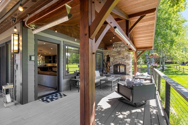 309 Fairway Dr, Whitefish, MT 59937 - wooden terrace with an outdoor living space with a fireplace
