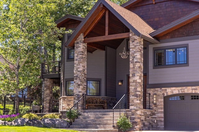 309 Fairway Dr, Whitefish, MT 59937 - view of front of property featuring stone siding, covered porch, a shingled roof, and a balcony