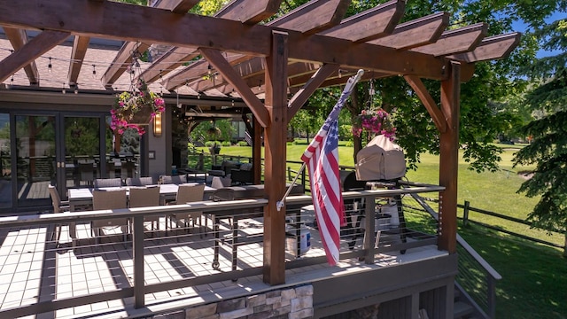 309 Fairway Dr, Whitefish, MT 59937 - deck featuring a pergola and a yard