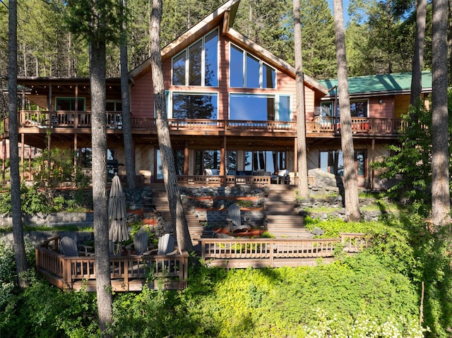14690 Shore Acres Dr, Bigfork, MT 59911 - back of property featuring a wooden deck