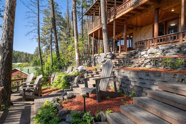 14690 Shore Acres Dr, Bigfork, MT 59911 - view of patio with a deck and stairway