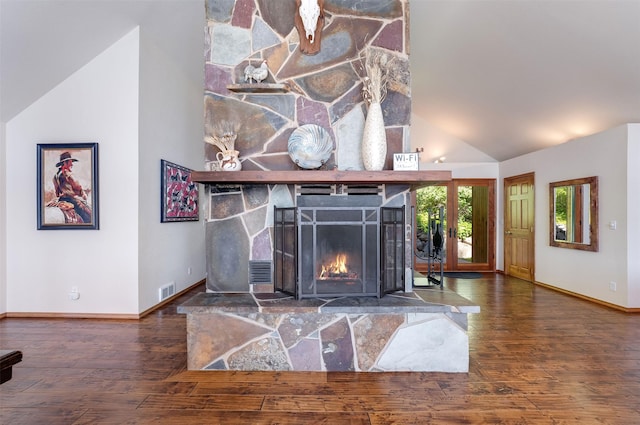 14690 Shore Acres Dr, Bigfork, MT 59911 - detailed view of baseboards, wood finished floors, and a fireplace