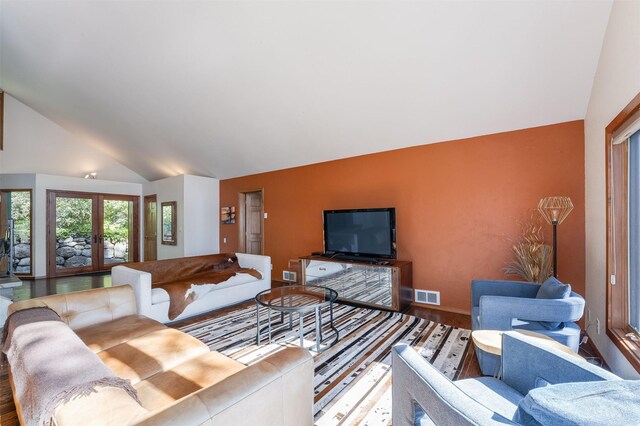 14690 Shore Acres Dr, Bigfork, MT 59911 - living area with wood finished floors and high vaulted ceiling