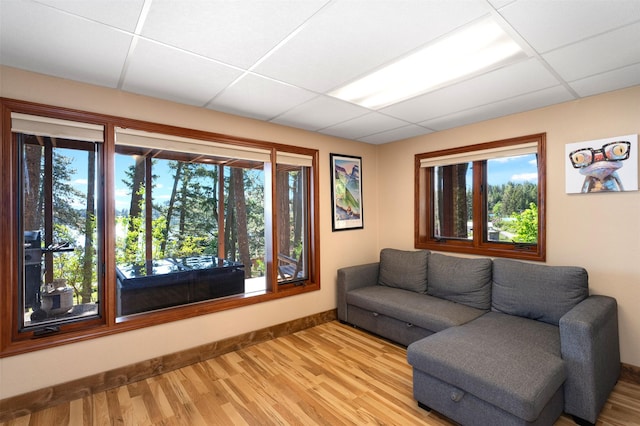 14690 Shore Acres Dr, Bigfork, MT 59911 - living area with a paneled ceiling and wood finished floors