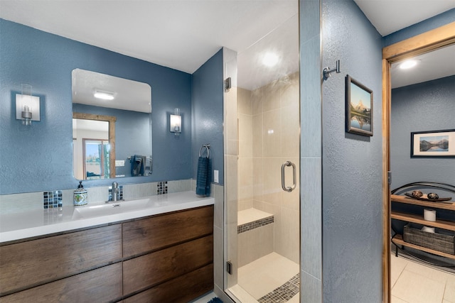 14690 Shore Acres Dr, Bigfork, MT 59911 - full bath with a textured wall, vanity, and a stall shower