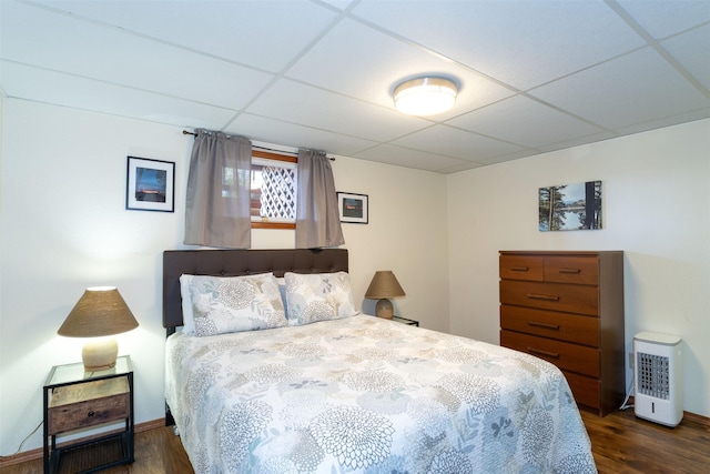 14690 Shore Acres Dr, Bigfork, MT 59911 - bedroom with a drop ceiling, wood finished floors, and baseboards