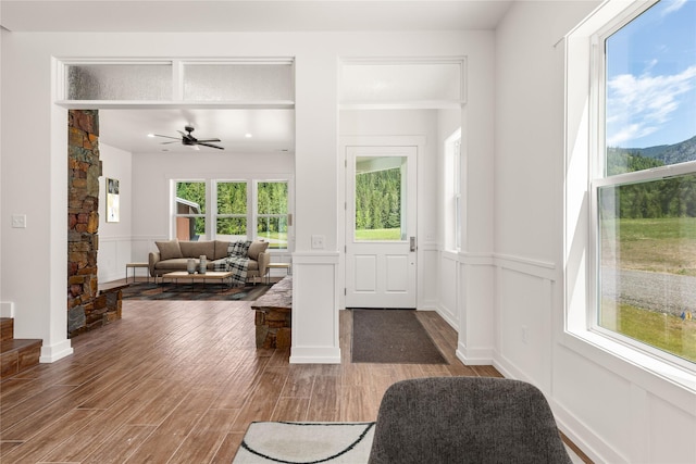 189 Blue Creek Rd, Heron, MT 59844 - entrance foyer with ceiling fan, wood finished floors, and a mountain view