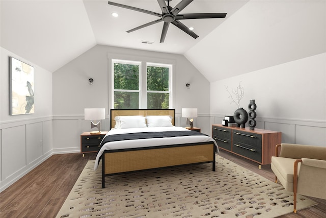 189 Blue Creek Rd, Heron, MT 59844 - bedroom featuring wood finished floors, wainscoting, vaulted ceiling, a ceiling fan, and a decorative wall