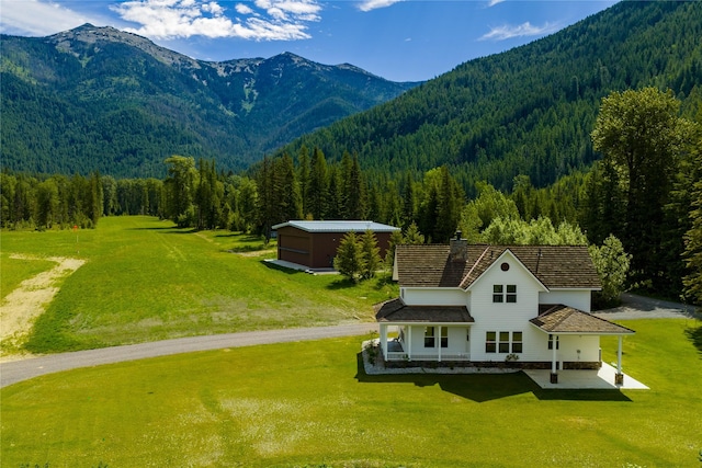 189 Blue Creek Rd, Heron, MT 59844 - view of mountain background with a heavily wooded area