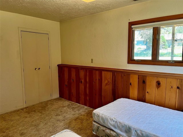 1114 Creek Crossing Rd, Missoula, MT 59802 - bedroom featuring a textured ceiling and carpet flooring