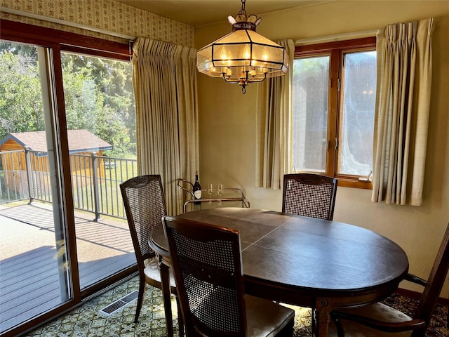 1114 Creek Crossing Rd, Missoula, MT 59802 - dining space with a chandelier