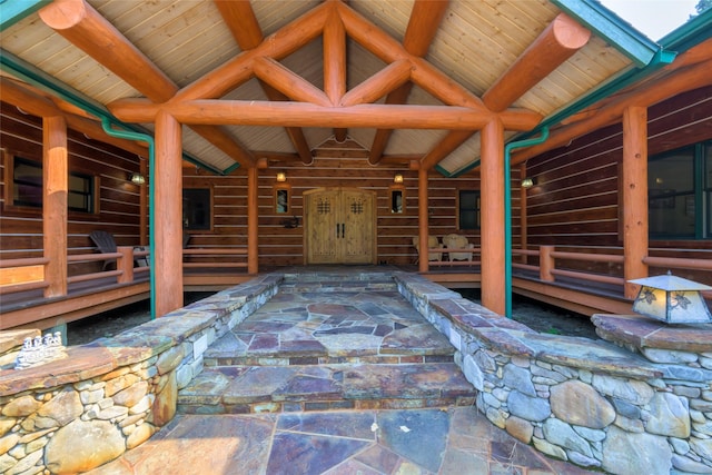 6900 Nez Perce Rd, Darby, MT 59829 - misc room with stone flooring and wooden ceiling