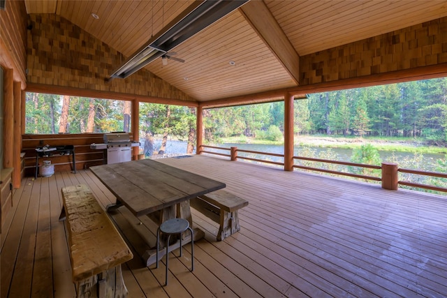 6900 Nez Perce Rd, Darby, MT 59829 - wooden deck with grilling area and outdoor dining space