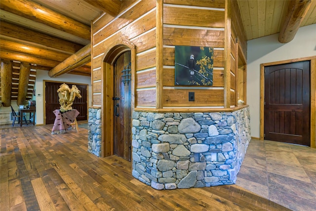 6900 Nez Perce Rd, Darby, MT 59829 - hallway featuring wooden ceiling with exposed beams, arched walkways, and wood-type flooring