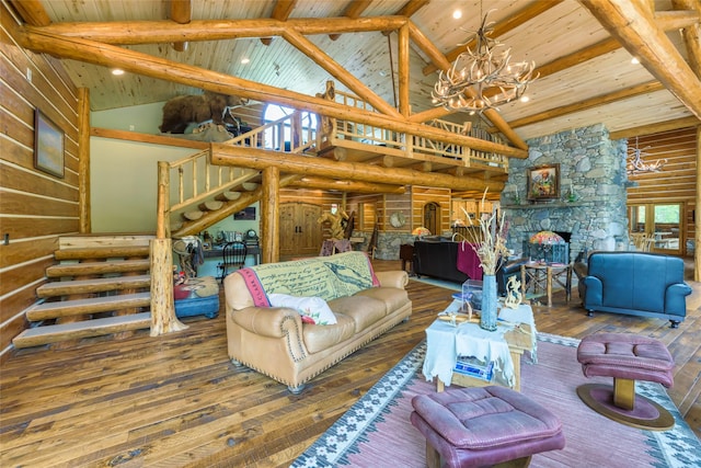 6900 Nez Perce Rd, Darby, MT 59829 - living room with wood-type flooring, stairway, wooden ceiling with exposed beams, a chandelier, and high vaulted ceiling