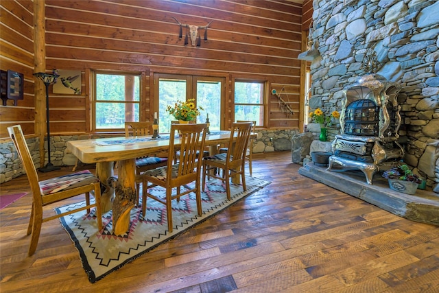 6900 Nez Perce Rd, Darby, MT 59829 - dining area with plenty of natural light, wooden walls, french doors, lofted ceiling, and wood finished floors