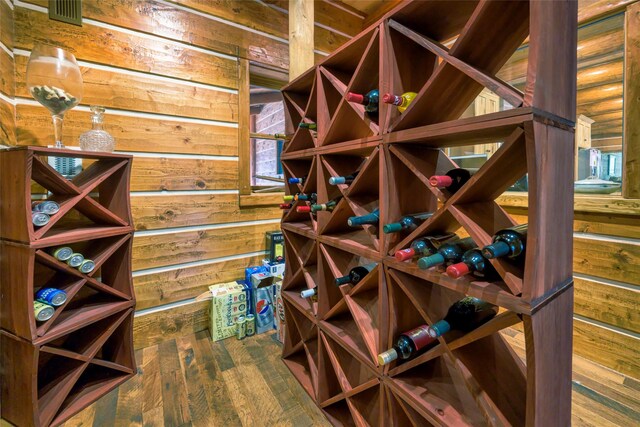 6900 Nez Perce Rd, Darby, MT 59829 - wine area featuring wooden walls and wood finished floors