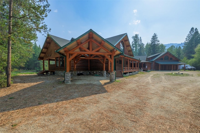 6900 Nez Perce Rd, Darby, MT 59829 - log home with driveway