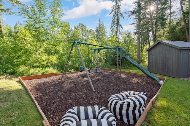 14833 Sunburst Dr, Bigfork, MT 59911 - view of jungle gym with a yard and a storage shed