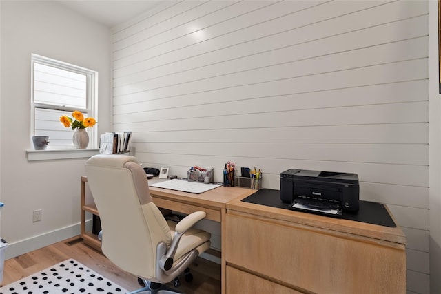 14833 Sunburst Dr, Bigfork, MT 59911 - office space with light wood-style floors and wood walls