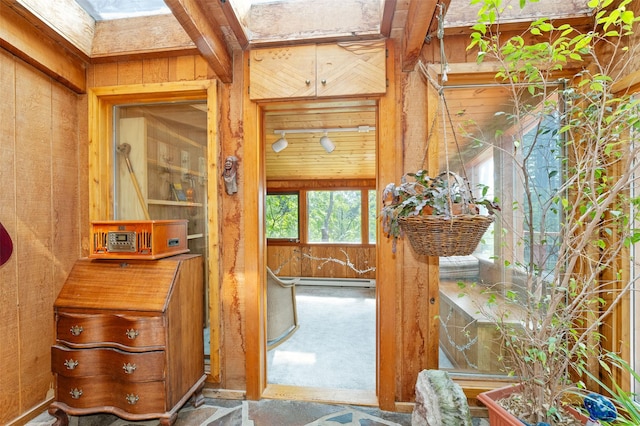 9230 Mt Highway 35, Bigfork, MT 59911 - bathroom featuring wooden walls and a baseboard radiator