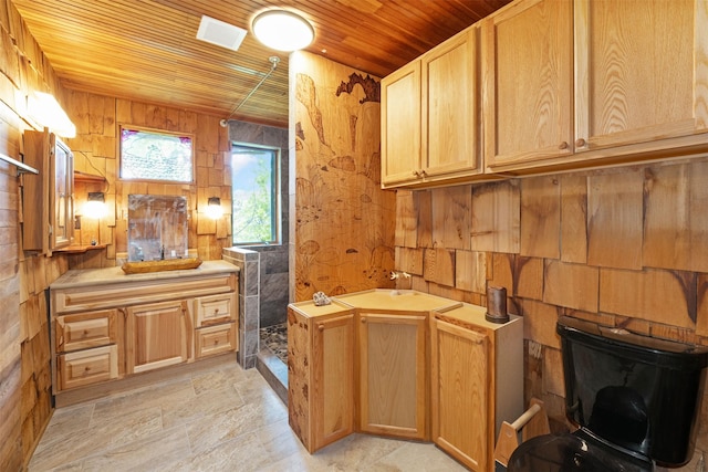 9230 Mt Highway 35, Bigfork, MT 59911 - full bathroom with wood ceiling, vanity, wooden walls, and a tile shower