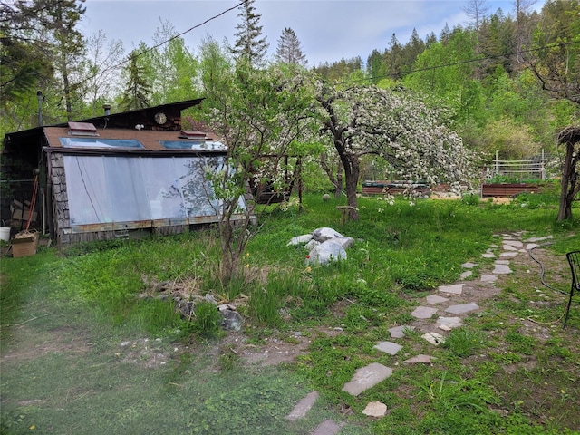9230 Mt Highway 35, Bigfork, MT 59911 - view of yard with a wooded view