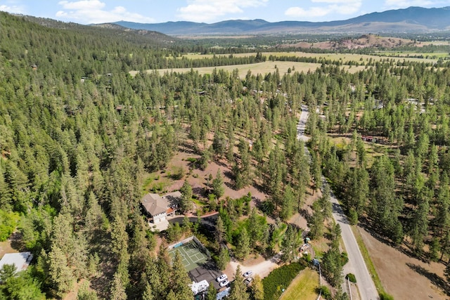 5959 Hayes Creek Rd, Missoula, MT 59804 - aerial view of a heavily wooded area and a mountain backdrop