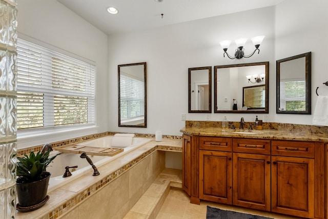 5959 Hayes Creek Rd, Missoula, MT 59804 - bathroom featuring a garden tub, vanity, a chandelier, tile patterned flooring, and recessed lighting