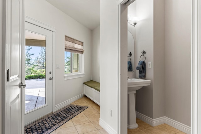 5959 Hayes Creek Rd, Missoula, MT 59804 - foyer entrance with light tile patterned flooring and baseboards