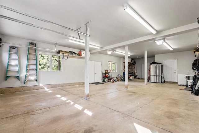 5959 Hayes Creek Rd, Missoula, MT 59804 - garage featuring freestanding refrigerator